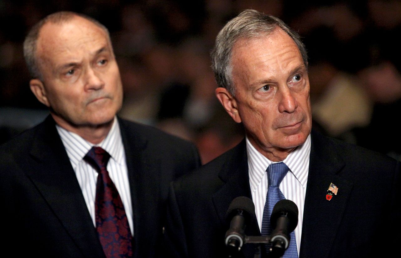 In this file photo from July 2010, then-New York City Mayor Michael Bloomberg (right) and then-NYPD Commissioner Raymond Kelly take questions after ceremonies swearing in new police recruits. 