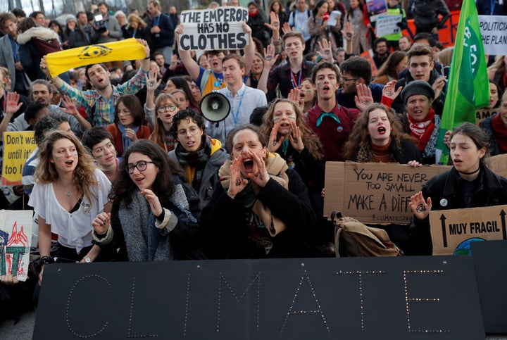 Activists protest outside the venue of the U.N. Climate Change Conference (COP25) in Madrid, Spain December 13, 2019. REUTERS/Susana Vera