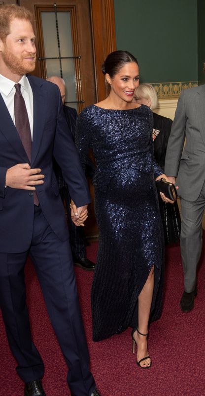 Harry and Meghan attend the premiere of Cirque du Soleil's "Totem" at the Royal Albert Hall in London.