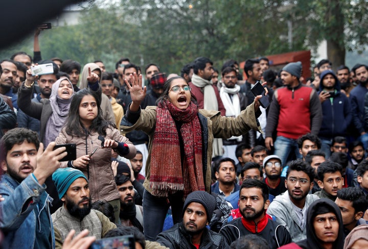 A student of the Jamia Millia Islamia university reacts during a demonstration after police entered the university campus on the previous day, following a protest against a new citizenship law, in New Delhi, India, December 16, 2019. REUTERS/Adnan Abidi