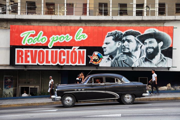 Habana, Cuba – September 12, 2011: Fidel, Che Guevara and Camilo in a political propaganda in Habana exalting the 1959 revolution. 