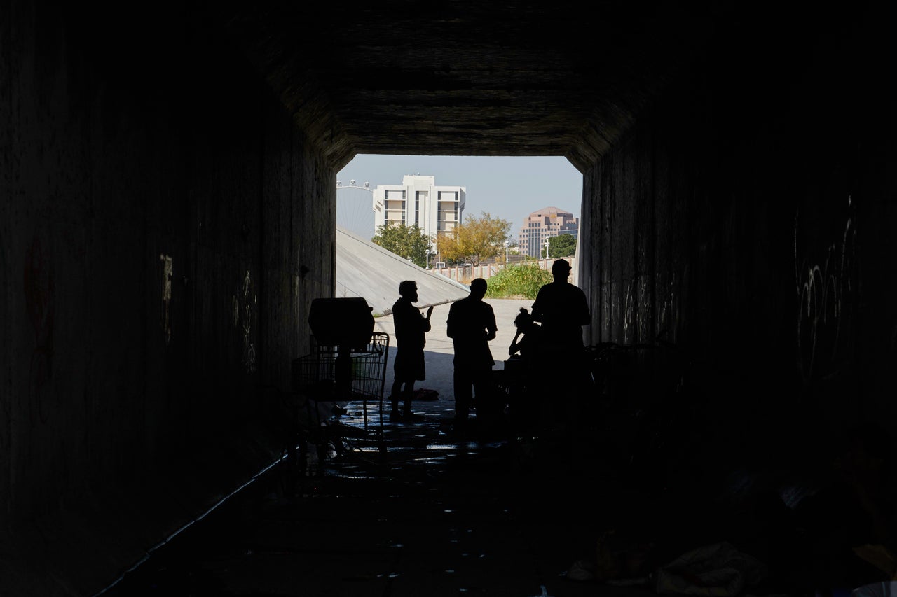 Individuals hang out in a short tunnel that's part of a wash system in Las Vegas, Nevada on Oct. 9, 2019.