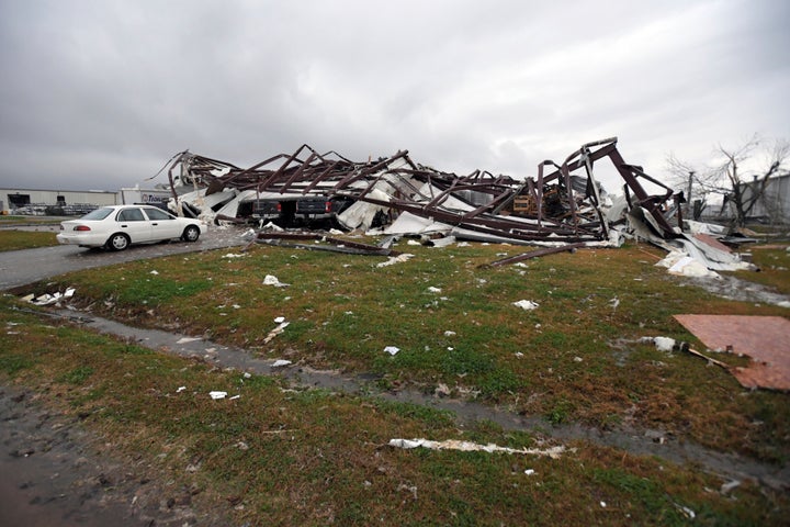 This photo shows some damage from a tornado to the TrimLine building on John Allison Drive in Alexandria, La. (AP Photo/Brad Kemp)