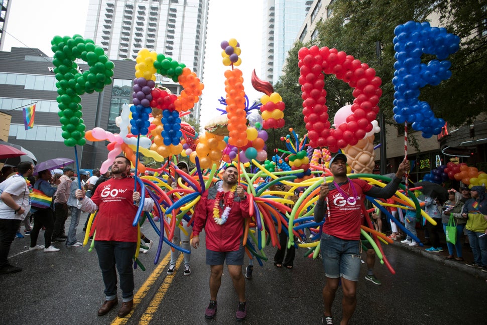 LGBTQ activists march during Atlanta's 2019 Pride parade. Four Georgia cities have passed ordinances protecting LGBTQ people