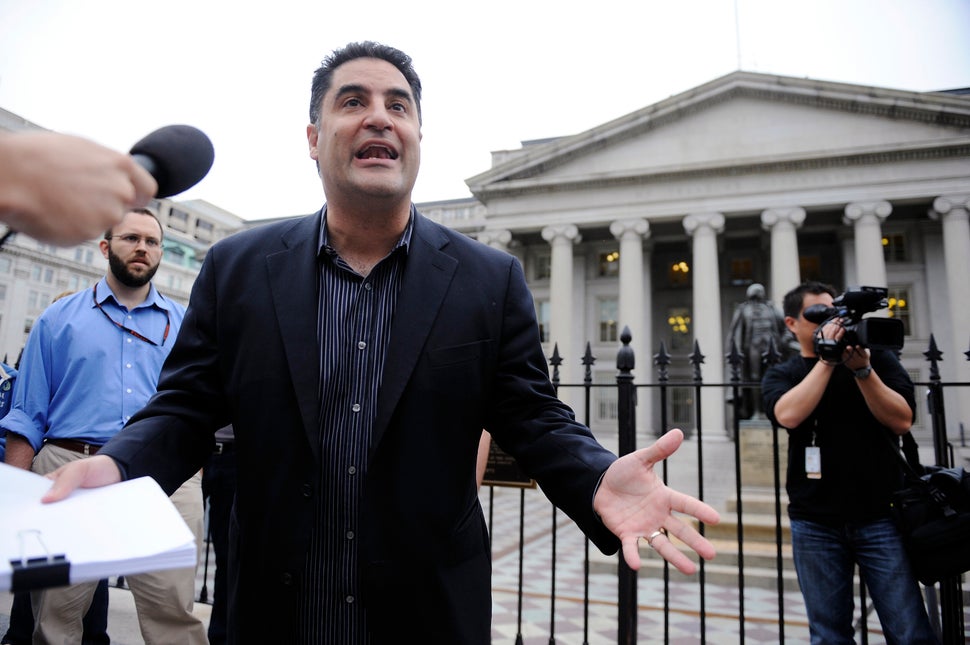 Cenk Uygur leads a protest of government bailout money given to Goldman Sachs in front of the U.S. Treasury building in Washi