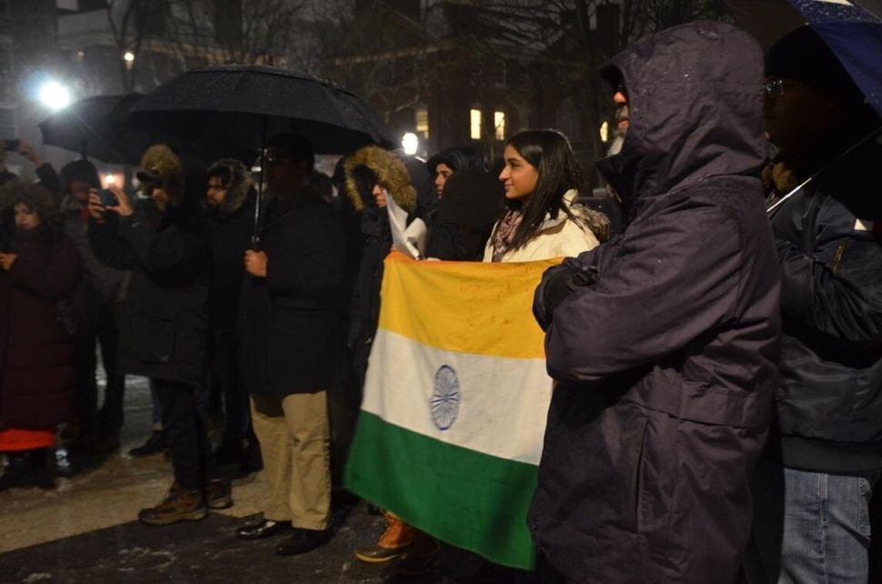 Dr Ruha Shadab holding the Indian national flag at the protest against India's Citizenship Act at Harvard University on December 17, 2019.