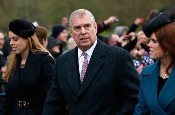 Prince Andrew and his daughter's Princess Beatrice and Princess Eugenie at Sandringham in 2015. 