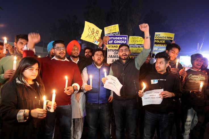 Demonstrators in Amritsar, India, shout slogans during a protest against a new citizenship law and to show solidarity with the students of New Delhi's Jamia Millia Islamia university, December 17, 2019.