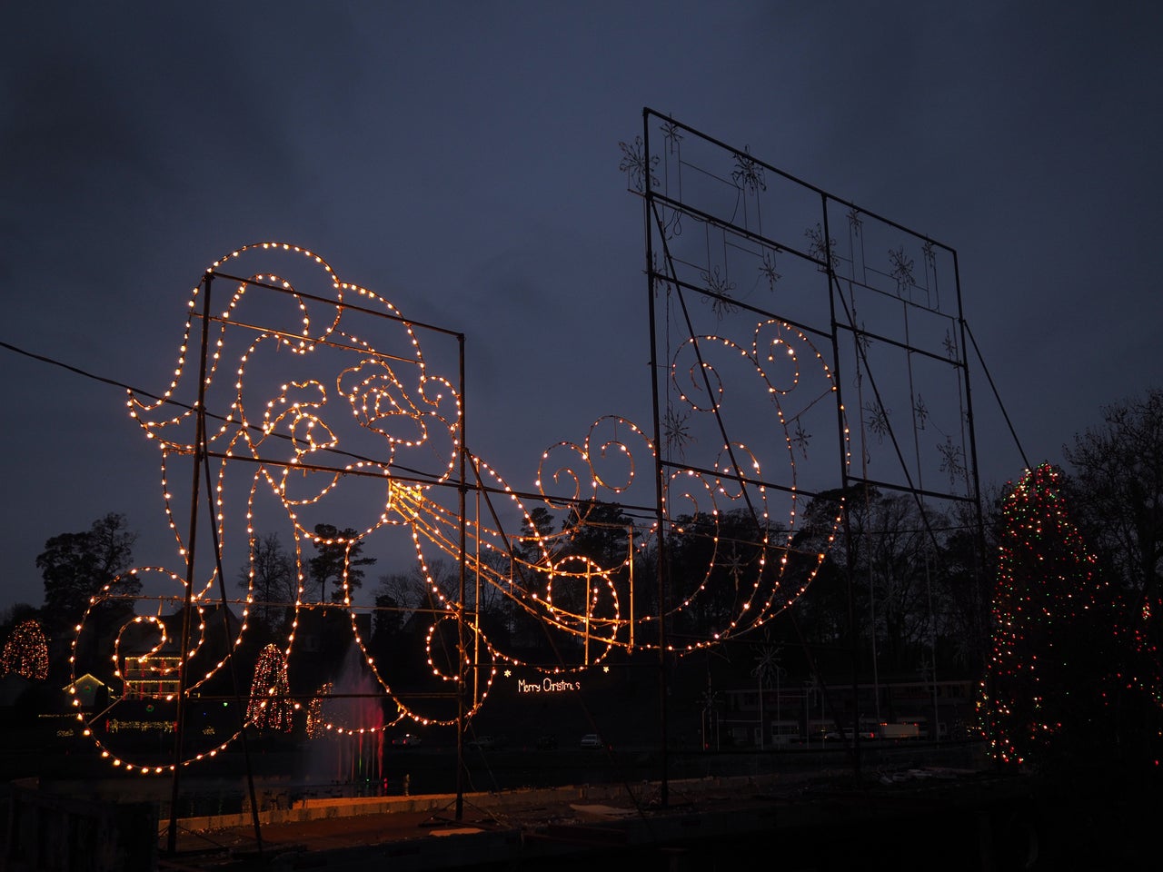 One of Christmas Town's public light displays viewed from behind.