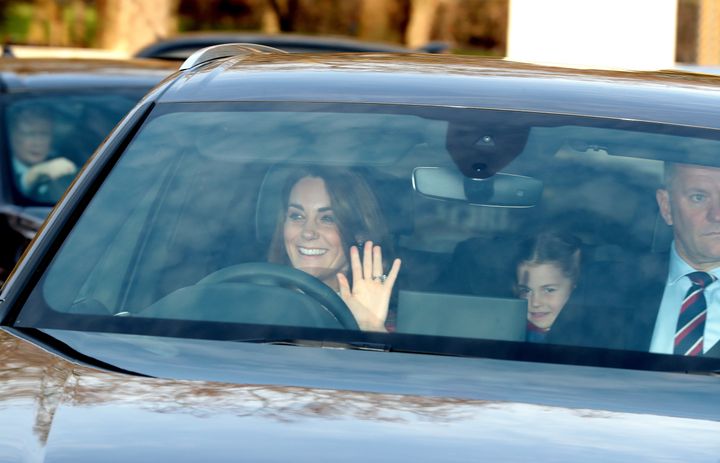 The Duchess of Cambridge and her daughter, Princess Charlotte, arrive for the Queen's Christmas lunch. 