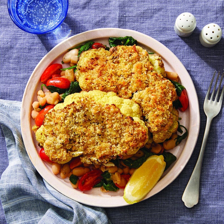 One of Blue Apron's new WW-approved recipes for 2020 includes this parmesan-crusted cauliflower steaks with white bean sauté and lemon, which also happens to have “Plant Forward” and “Carb Conscious” labels, too. 