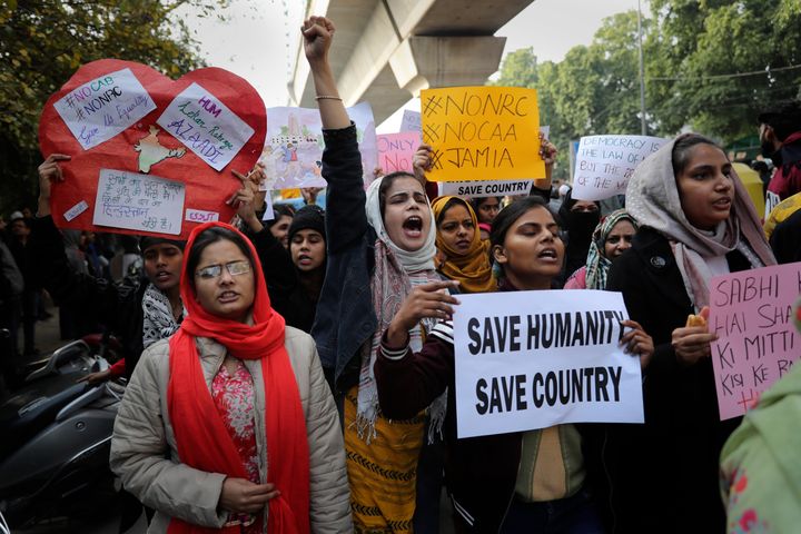 Indian students of the Jamia Millia Islamia University shout slogans as they march during a protest, in New Delhi, on December 18, 2019. 