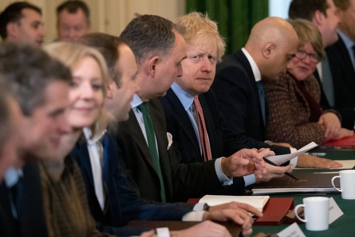 Britain's Prime Minister Boris Johnson prepares to speak during his first cabinet meeting since the general election, inside 10 Downing Street. 