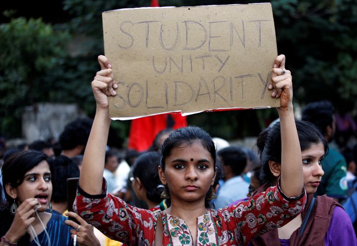A demonstrator during a protest march to show solidarity with the students of New Delhi's Jamia Millia Islamia university students. 