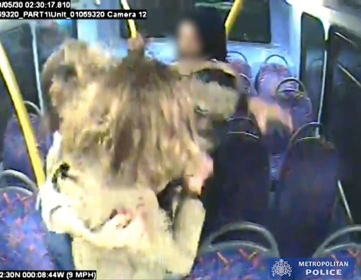 Handout CCTV grab issued by the Metropolitan Police of the women being surrounded by a group on teenagers during the incident on board a night bus 
