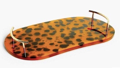 <a href="https://fave.co/2MaYBFS" target="_blank" rel="noopener noreferrer">Tortoiseshell Drinks Tray, John Lewis,</a> £30