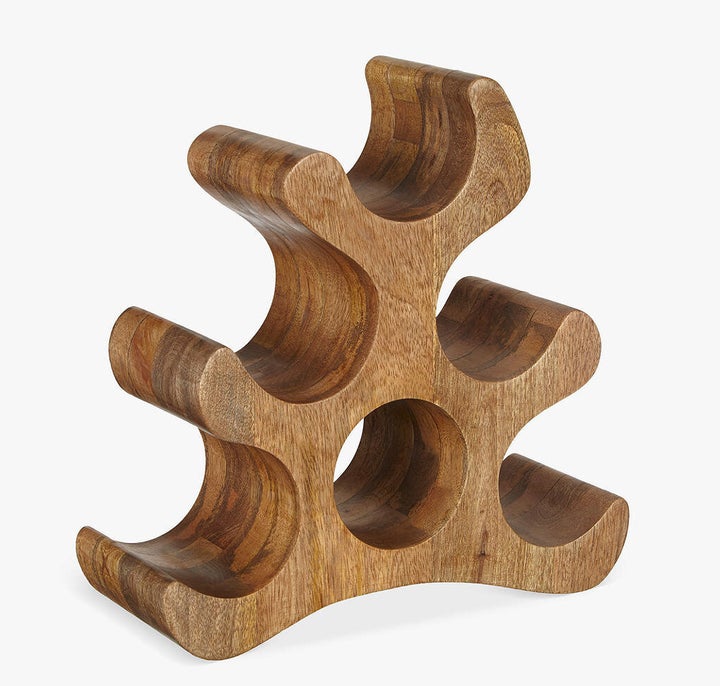 <a href="https://fave.co/2sThYfS" target="_blank" rel="noopener noreferrer">6 Bottle Wine Rack, John Lewis,</a> £65 