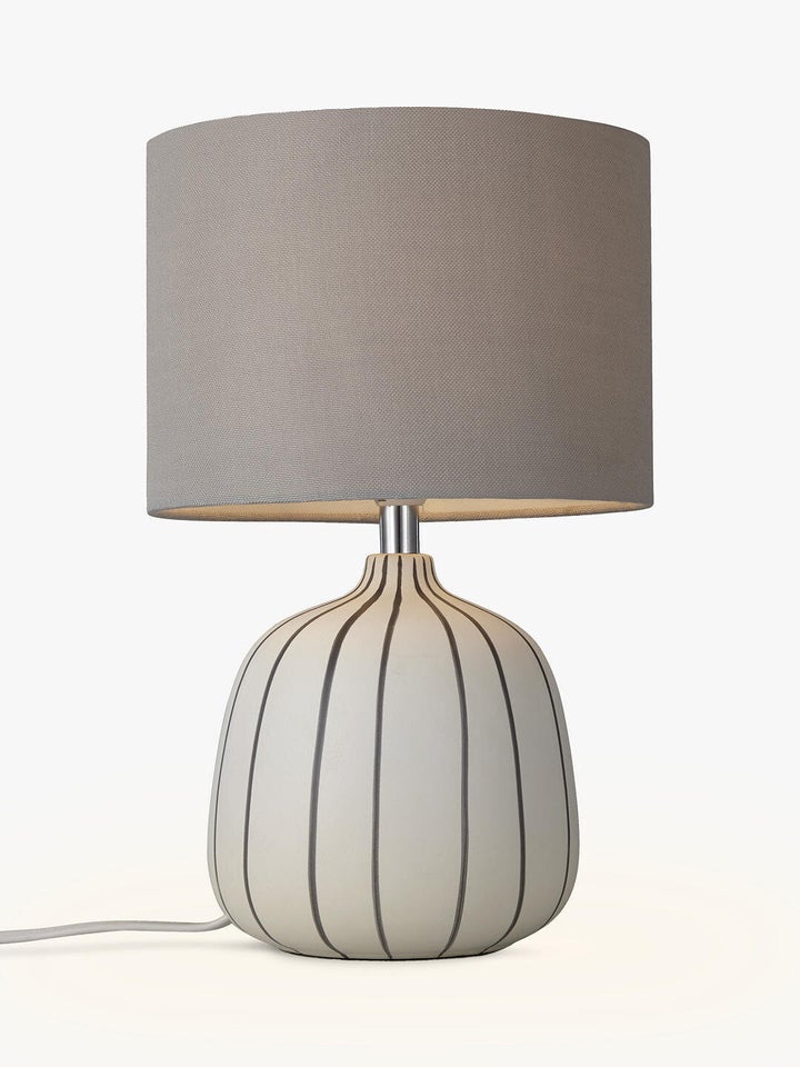 <a href="https://fave.co/2M8PepV" target="_blank" rel="noopener noreferrer">Candy Table Lamp, John Lewis,</a> £35