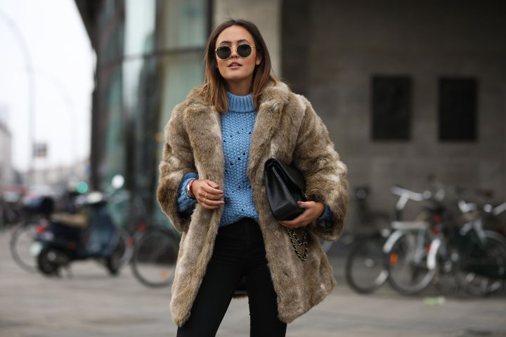 Laura Noltemeyer at Berlin Fashion Week wearing a faux fur coat on Dec. 12, 2019.