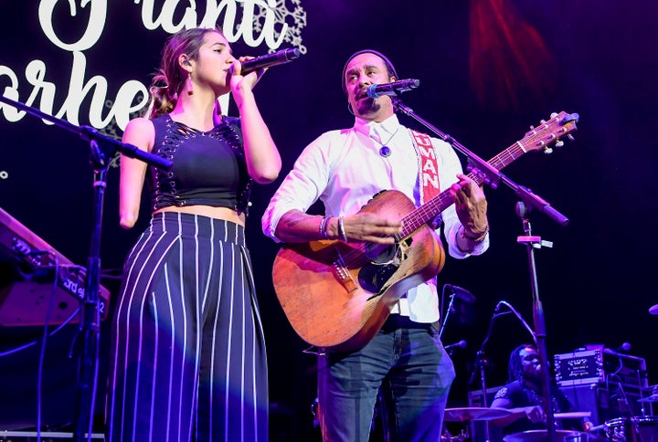 Canal (left) toured extensively with Michael Franti in 2018. Earlier this year, they collaborated on "The Flower," a track on Franti's latest album.