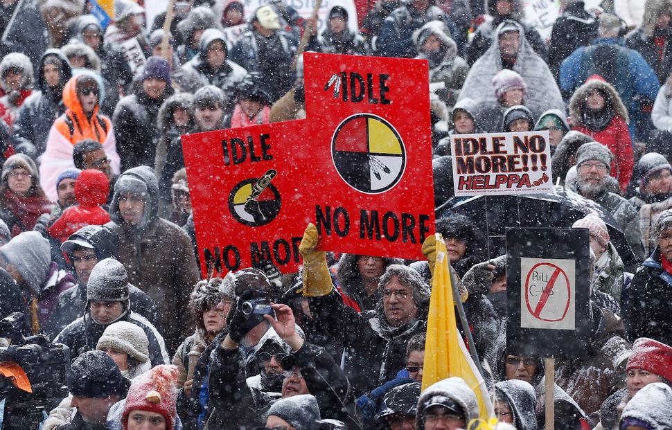 First Nations protestors take part in an "Idle No More" demonstration on Parliament Hill in Ottawa on Jan. 28, 2013. 