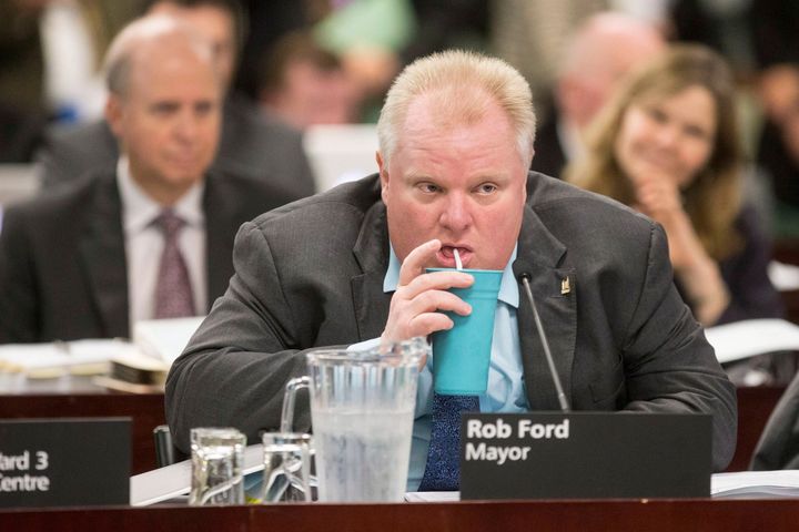 Toronto City Mayor Rob Ford sips out of a straw during an Executive Committee meeting at Toronto's City Hall on Dec. 5 2013.