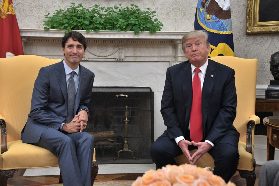 Prime Minister Justin Trudeau and U.S. President Donald Trump look on during their meeting at the White House in Washington, D.C., on Oct. 11, 2017.