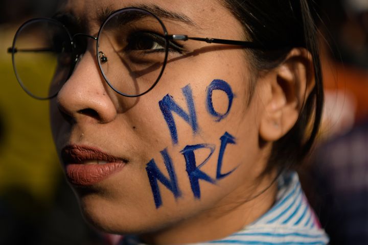 KOLKATA, INDIA - 2019/12/19: No NRC painted on a woman's face during massive demonstrations.Contentious Citizenship Amendment Act, which was cleared by parliament has sparked violent protests all across India. (Photo by Avijit Ghosh/SOPA Images/LightRocket via Getty Images)