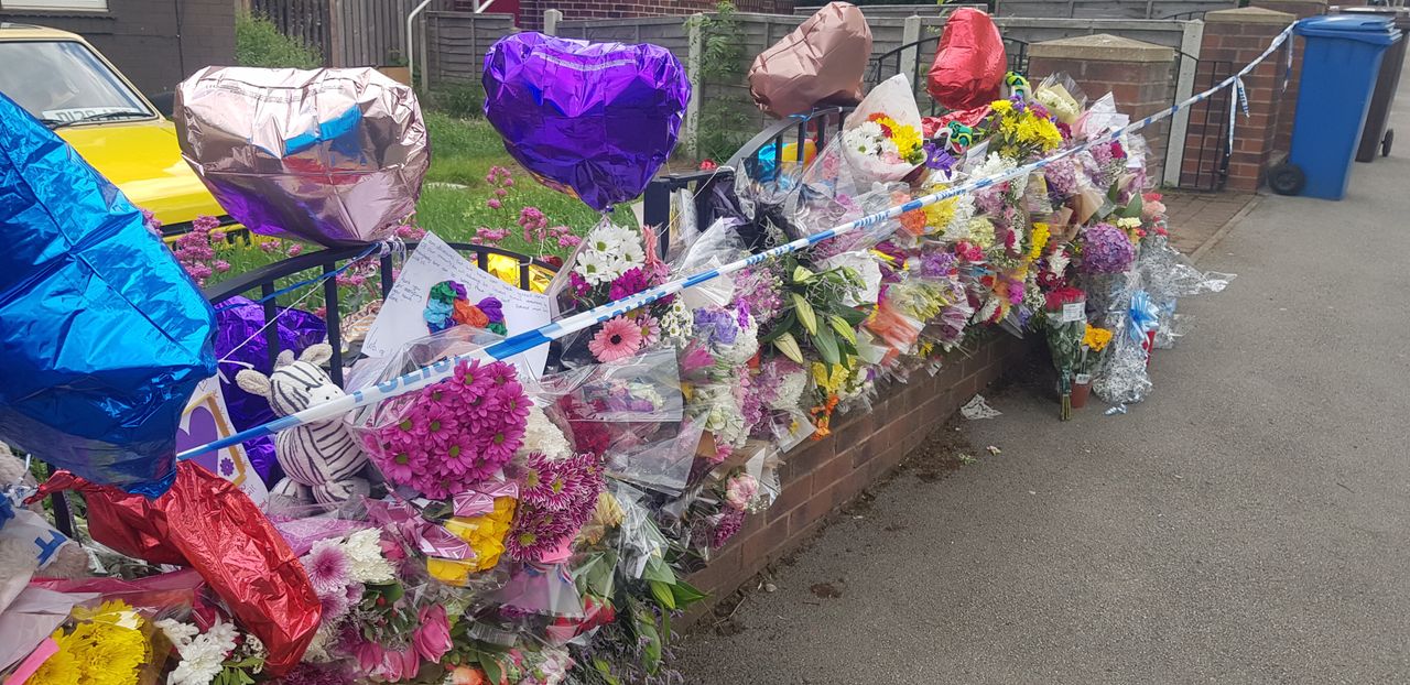 Floral tributes left outside the house in the aftermath of Tristan and Blake's deaths