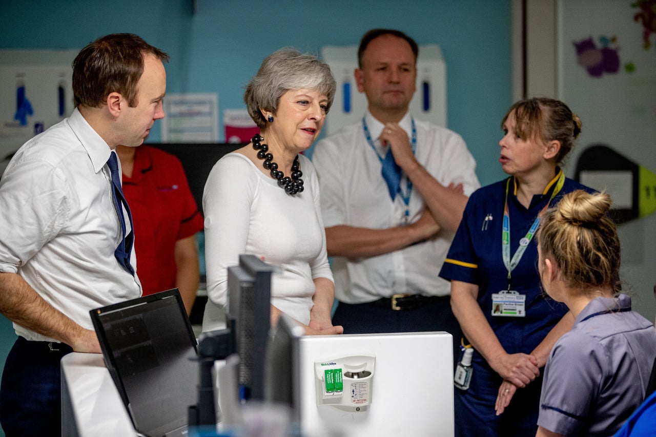 Former prime minister Theresa May with health secretary Matt Hancock at Alder Hey Children's Hospital 