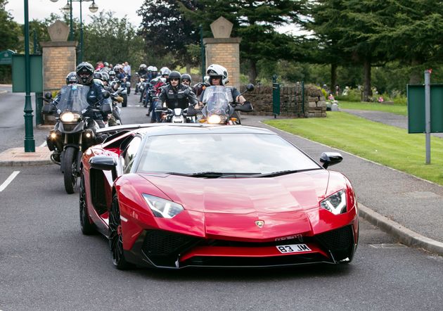 Lamborghinis and motorbikes escort the funeral cortege arriving at Grenoside Crematorium, Sheffield, prior to the funeral of Tristan and Blake Barrass.