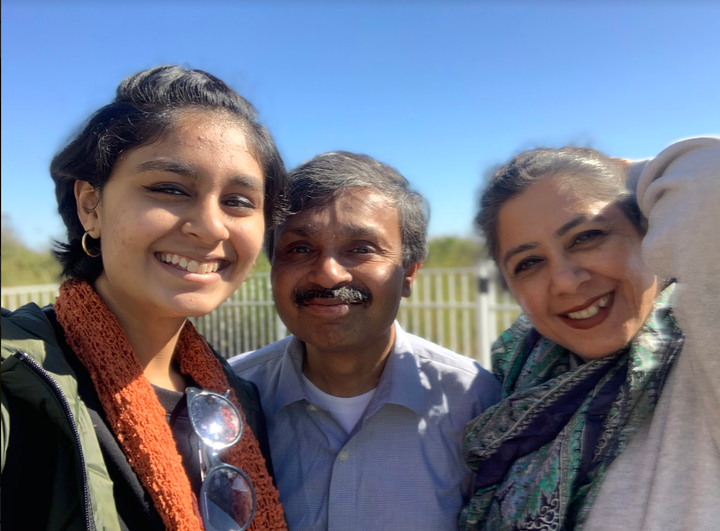 The author (right), her husband and their daughter.