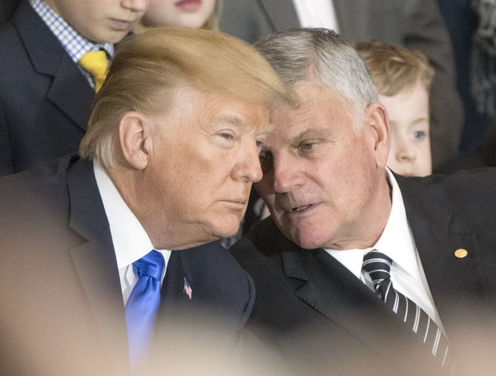 U.S. President Donald J. Trump, left, and Franklin Graham, right, talk during a memorial ceremony for the Rev. Billy Graham in the rotunda of the United States Capitol in Washington, D.C. on Wednesday, Feb. 28, 2018.