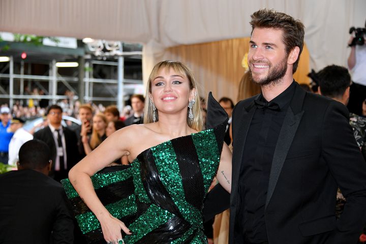 Miley Cyrus and Liam Hemsworth attend the 2019 Met Gala Celebrating Camp: Notes on Fashion at Metropolitan Museum of Art in May 2019 in New York City.