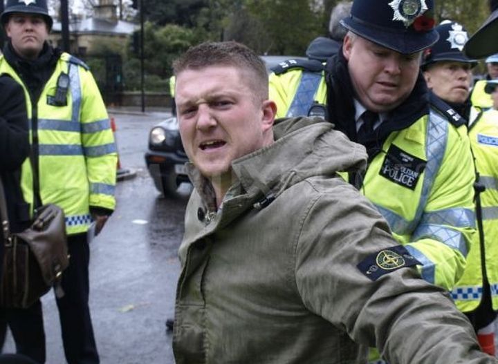 Tommy Robinson, real name Stephen Yaxley-Lennon, being arrested by police in London.