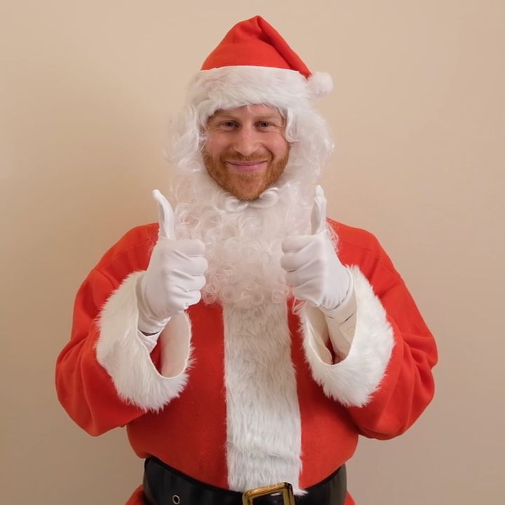 Prince Harry dressed up as Santa Claus, or as some might call him, Father Christmas. 