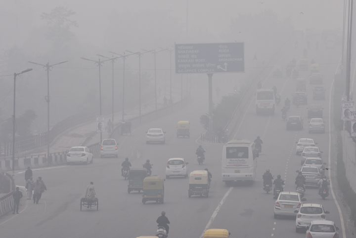 NEW DELHI, INDIA - DECEMBER 20: Traffic is seen amid dense fog, at Geeta colony on December 20, 2019 in New Delhi, India. (Photo by Sonu Mehta/Hindustan Times via Getty Images)