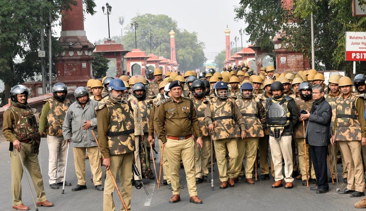 LUCKNOW, INDIA - DECEMBER 20: Police personnel stand guard during anti CAA protest, Old City on December 20, 2019 in Lucknow,