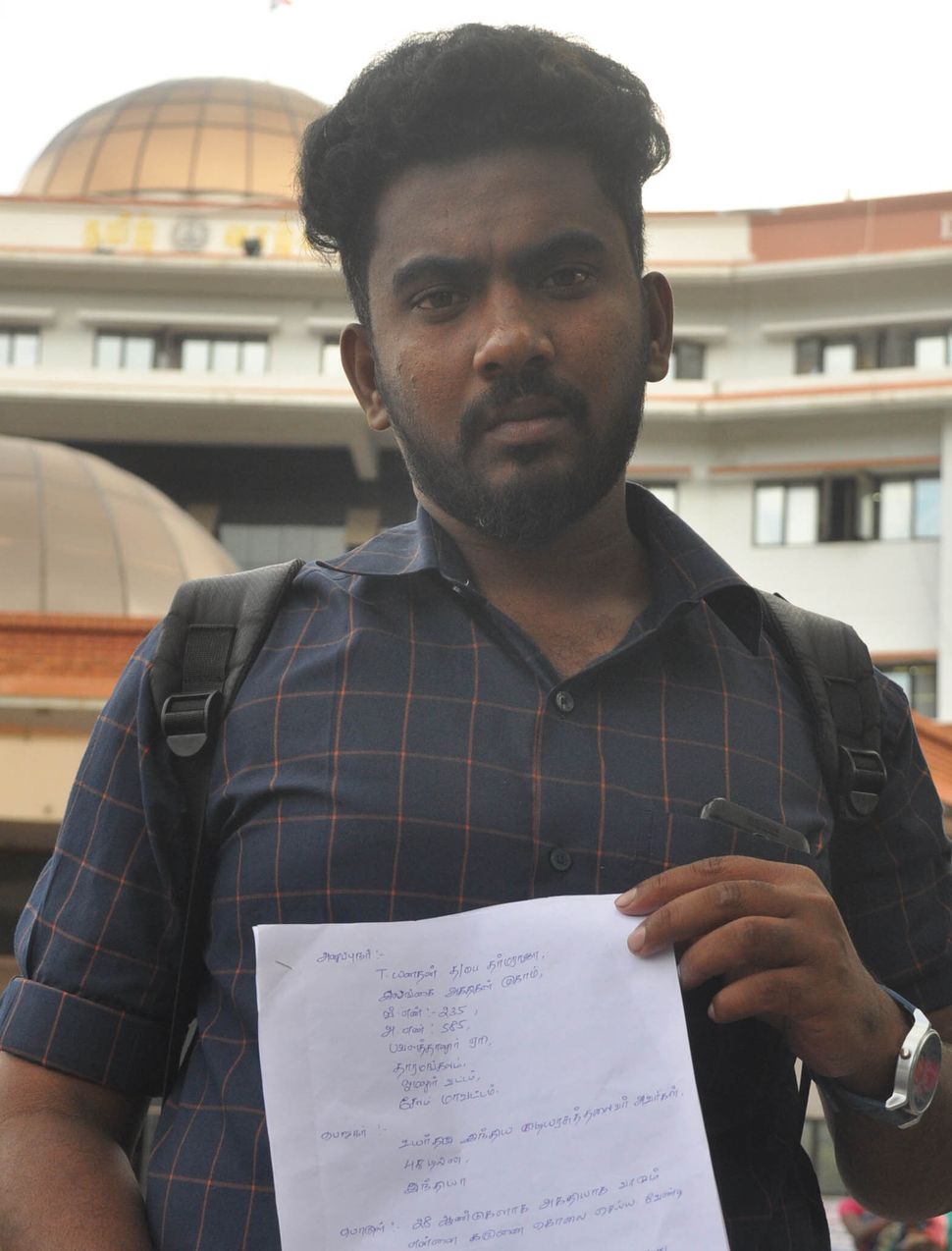 Yanadhan in front of the Salem district collectorate. He has sent copies of his petition reuqesting a mercy killing to President Ram Nath Kovind and Tamil Nadu governor Banwarilal Purohit.