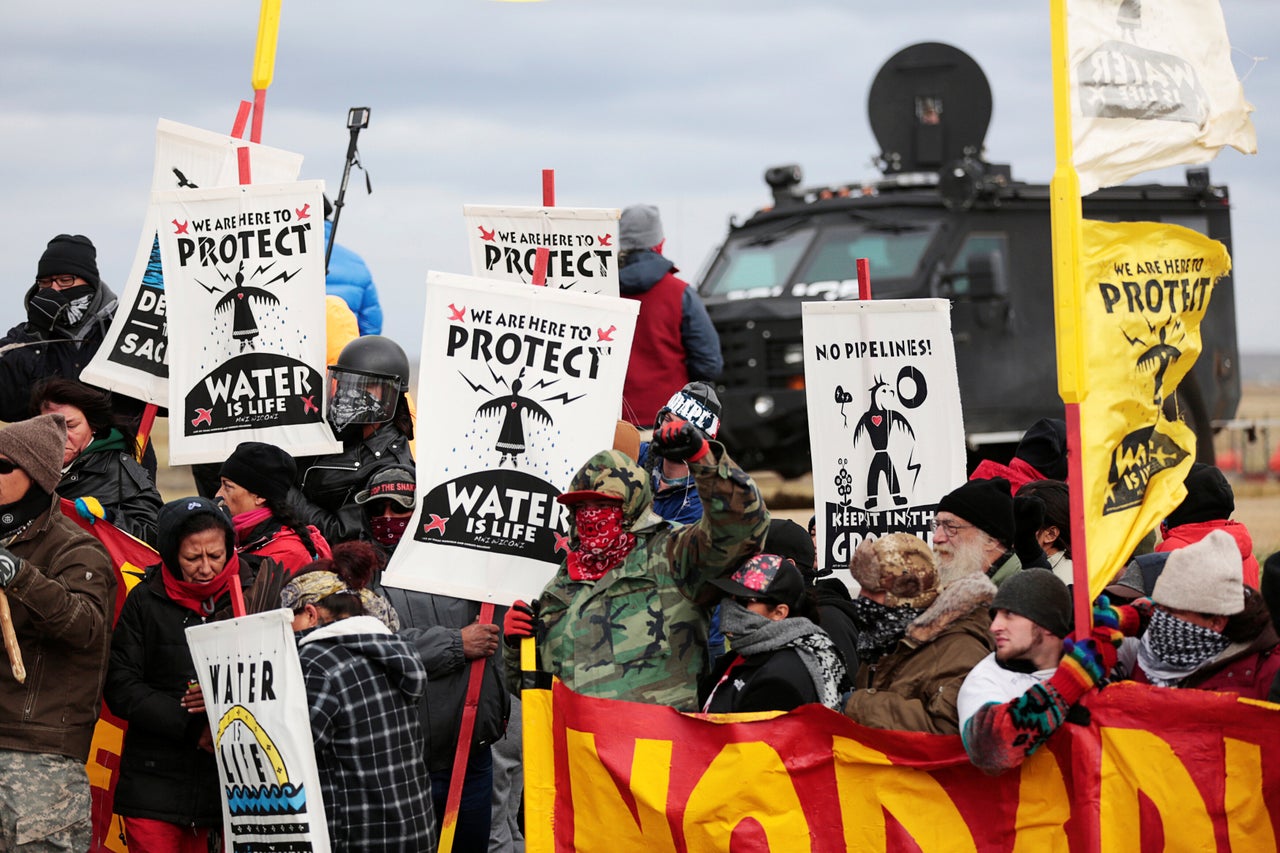 Dakota Access Pipeline protesters square off against police near the Standing Rock Reservation and the pipeline route outside the little town of Saint Anthony, North Dakota on Oct. 5, 2016.