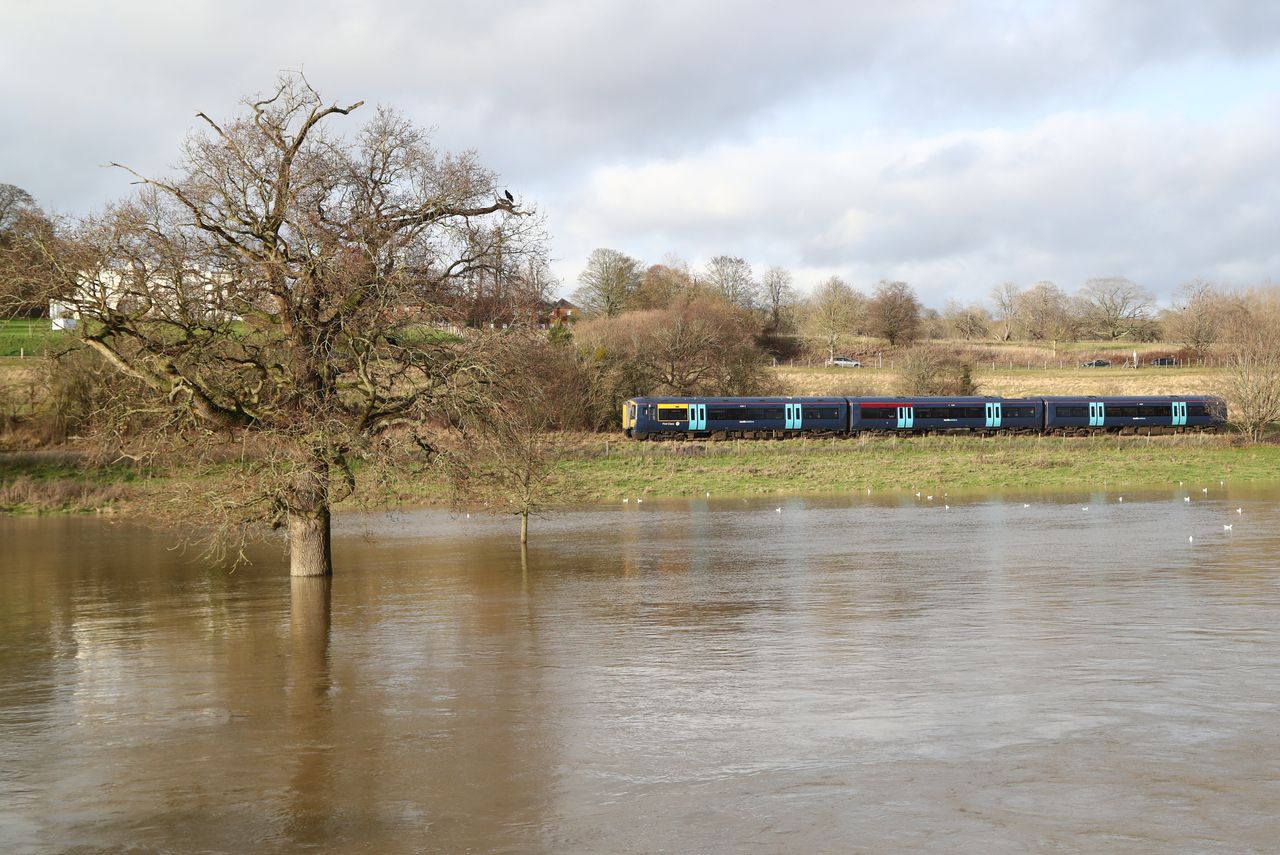 A train passes by Teston Bridge in West Farleigh near Maidstone, Kent.