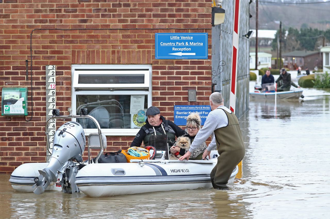 Residents of Little Venice Caravan Park in Yalding are rescued by boat from floodwater.