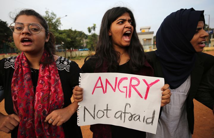Students shout slogans during a protest against the Citizenship Amendment Act in Bangalore, December 20, 2019. 