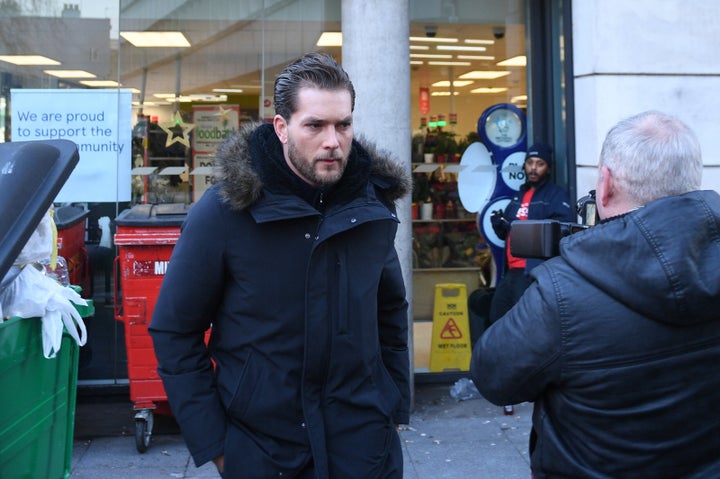 Lewis Burton arrives at Highbury Corner Magistrates' Court, where his girlfriend Caroline Flack is charged with assault.