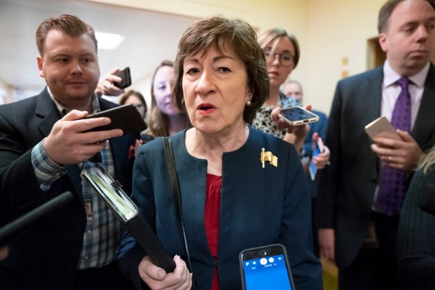 In this Nov. 6, 2019, file photo, Sen. Susan Collins (R-Maine) is surrounded by reporters as she heads...