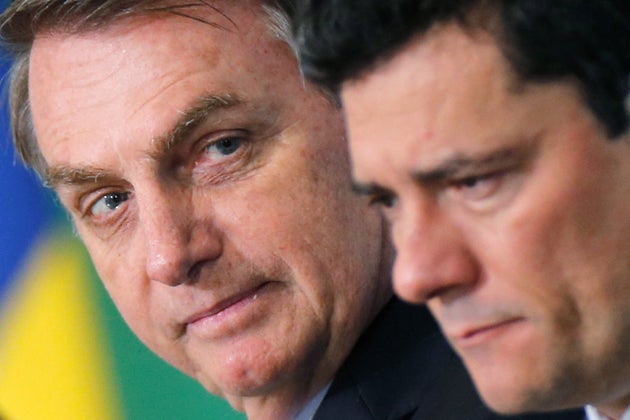 Brazil's President Jair Bolsonaro and Brazil's Justice Minister Sergio Moro attend a launch ceremony of the government anti-crime project at the Planalto Palace in Brasilia, Brazil October 3, 2019. REUTERS/Adriano Machado