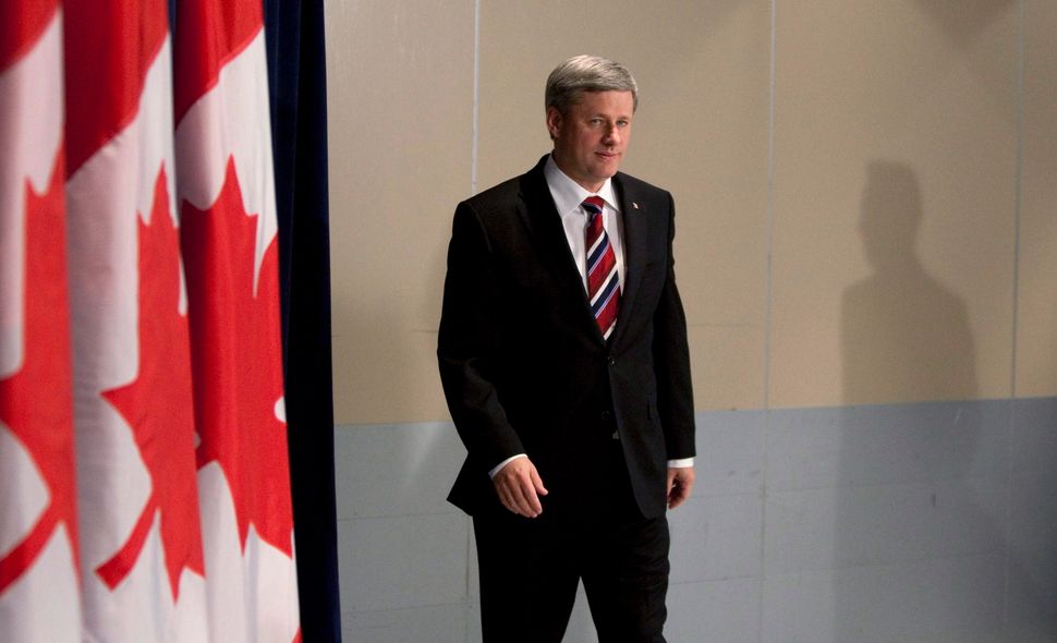 Former prime minister Stephen Harper arrives to speak to reporters during a news conference following the 2009 United Nations Climate Change Conference in Copenhagen on Dec. 18, 2009.