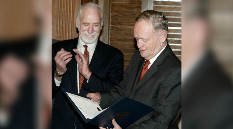 Former prime minister Jean Chrétien looks over the Kyoto Protocol with David Anderson, the federal environment minister at the time, in Ottawa on Dec. 16, 2002.