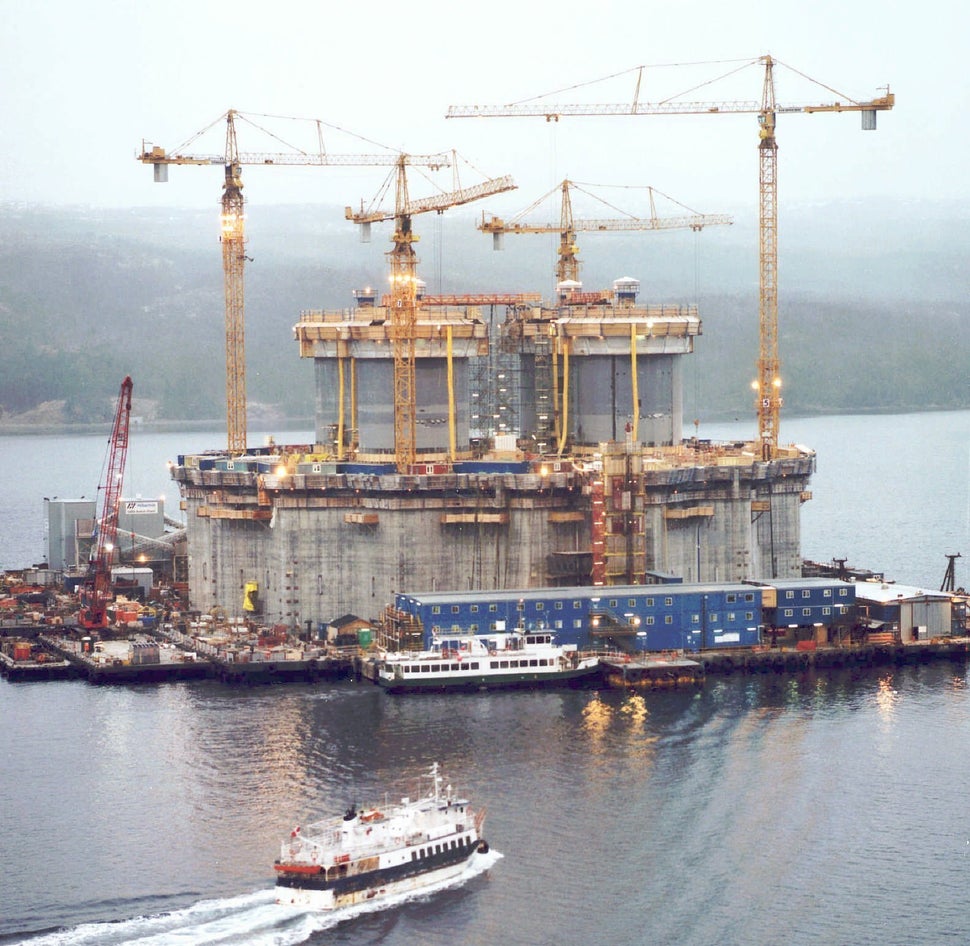 Construction crews are seen here putting the finishing touches on the massive base section of the $4.2-billion Hibernia offshore oil platform in Bull Arm, N.L., in April 1996. The federal government bought a stake in the project in 1993 to help save it from collapse.