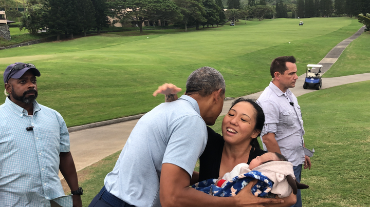 Ilar gives Obama a hug after he meets Levi.